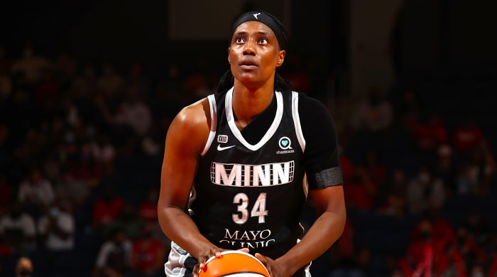 Sylvia Fowles holding a basketball